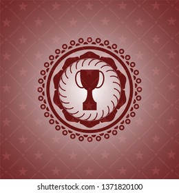 trophy icon inside red emblem