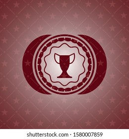 trophy icon inside red emblem