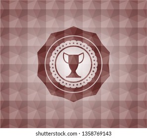 trophy icon inside red seamless badge with geometric pattern.