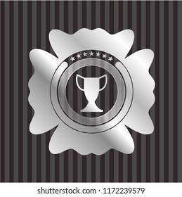 trophy icon inside silver emblem