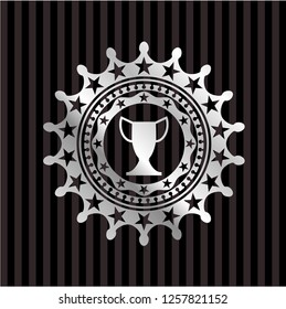 trophy icon inside silvery emblem or badge