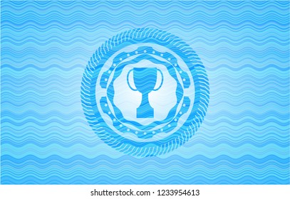 trophy icon inside sky blue water wave style emblem.