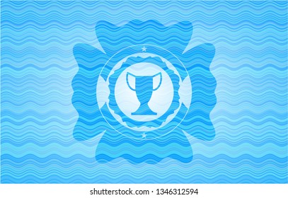 trophy icon inside sky blue water wave style badge.