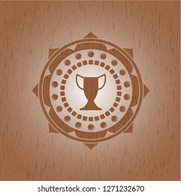trophy icon inside vintage wooden emblem