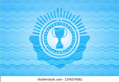 trophy icon inside water concept style emblem.