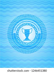trophy icon inside water style badge.