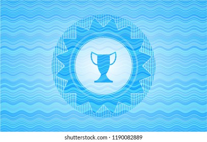 trophy icon inside water wave representation style emblem.
