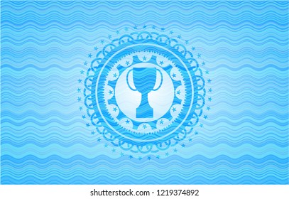 trophy icon inside water wave representation style badge.