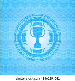 trophy icon inside water wave emblem background.