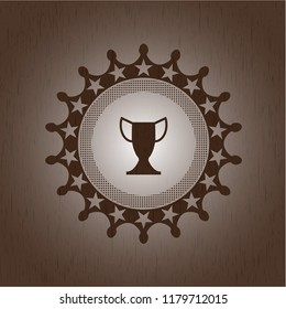 trophy icon inside wooden emblem. Vintage.