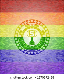 trophy with money symbol inside icon inside emblem on mosaic background with the colors of the LGBT flag