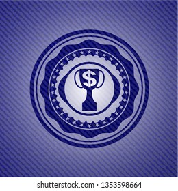 trophy with money symbol inside icon inside badge with denim background