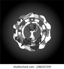 trophy with money symbol inside icon inside grey camouflage emblem