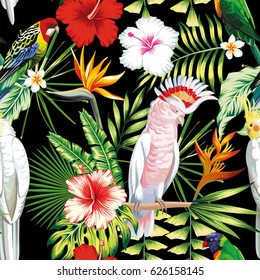 Tropic exotic multicolor birds parrot, macaw with tropical plants, banana palm leaves, flowers Strelitzia, hibiscus on a black background. Print jungle seamless vector pattern