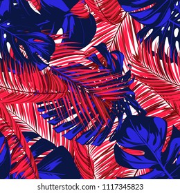 Tropic Seamless Pattern with Palm Leaves and Monstera. Exotic Summer Background. Jungle Foliage. Vector Leaf of Philodendron and Palm. Bright Tropical Seamless Pattern in Blue and Red Colors. EPS10.
