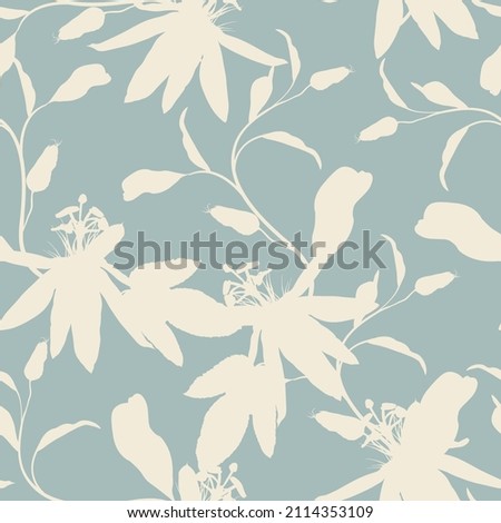 Tropic summer painting seamless pattern with exotic flower branch silhouette. Trendy exotic flower wallpaper on blue background.