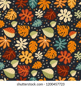 Tropical autumn leaves. Floral vector illustration. Exotic jungle background. Trend graphics. Seamless pattern with fall leaves. Forest background. Colors of harvest