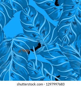 Tropical background with banana leaves. A seamless pattern with tropical leaves.