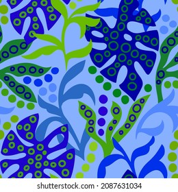 Tropical background. Botanical seamless pattern with decorative palm leaves in ethnic style. Modern ornament. Exotic leaves. For fabric, textile, wrap, wallpaper.