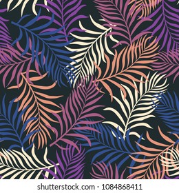 Tropical background with colorful palm leaves. Seamless floral pattern. Summer vector illustration