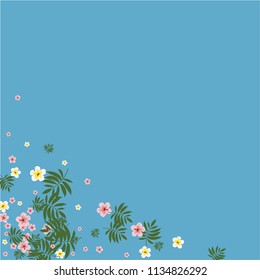 Tropical background with hibiscus flowers and tropical leaves.