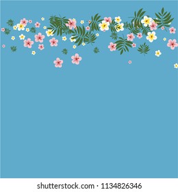 Tropical background with hibiscus flowers and tropical leaves.