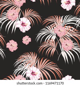 Tropical background with jungle plants. Seamless vector tropical pattern with light palm leaves and tropical pink hibiscus flowers on black background.