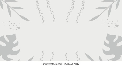 Tropical background from leaves on a gray background.
