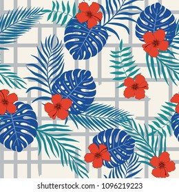 Tropical background with palm leaves and flowers. Seamless floral pattern. Summer vector illustration