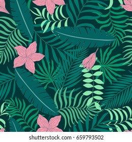 Tropical background with palm leaves and flowers. Seamless floral pattern