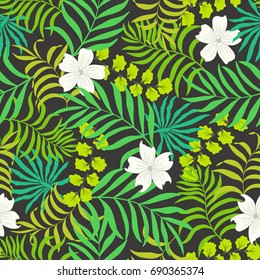 Tropical background with palm leaves and flowers. Seamless floral pattern