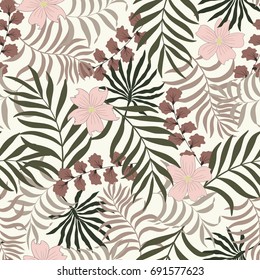 Tropical background with palm leaves and flowers. Seamless floral pattern