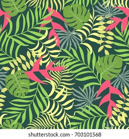 Tropical background with palm leaves and flowers. Seamless floral pattern