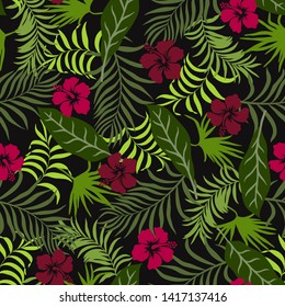 Tropical background with palm leaves and hibiscus flowers. Seamless floral pattern. Summer vector illustration. Flat jungle print