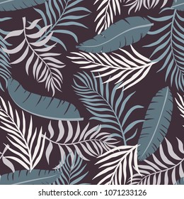 Tropical background with palm leaves. Seamless floral pattern. Summer vector illustration