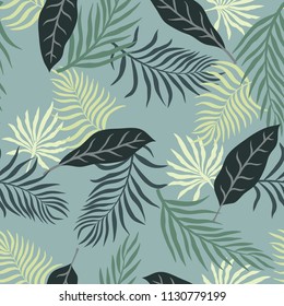 Tropical background with palm leaves. Seamless floral pattern. Summer vector illustration