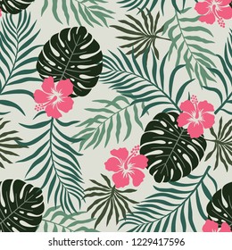 Tropical background with palm leaves. Seamless floral pattern. Summer vector illustration. Flat jungle print