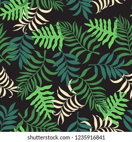 Tropical background with palm leaves. Seamless floral pattern. Summer vector illustration. Flat jungle print