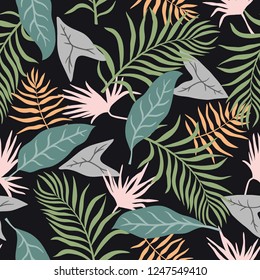 Tropical background with palm leaves. Seamless floral pattern. Summer vector illustration. Flat jungle print