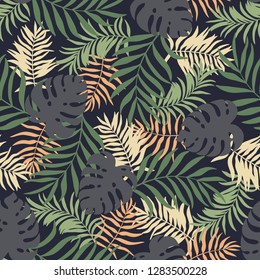 Tropical background with palm leaves. Seamless floral pattern. Summer vector illustration. Flat jungle print