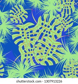 Tropical background - palm leaves seamless pattern.