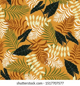 Tropical background with palm leaves. Seamless floral pattern. Summer vector illustration. Flat jungle print