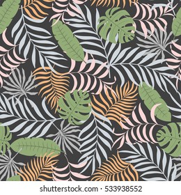 Tropical background with palm leaves. Seamless floral pattern