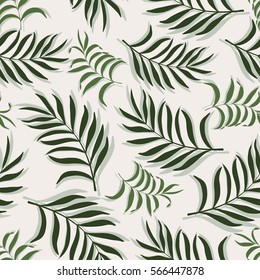 Tropical background with palm leaves. Seamless floral pattern