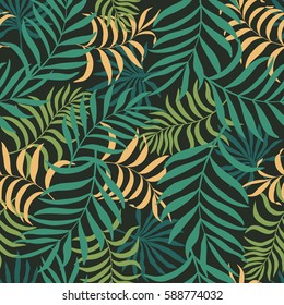 Tropical background with palm leaves. Seamless floral pattern