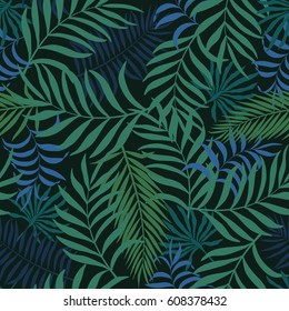 Tropical background with palm leaves. Seamless floral pattern