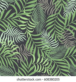 Tropical background with palm leaves. Seamless floral pattern