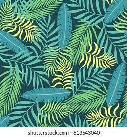 Tropical background with palm leaves. Seamless floral pattern