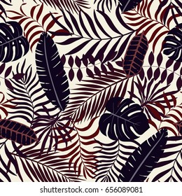 Tropical background with palm leaves. Seamless floral pattern