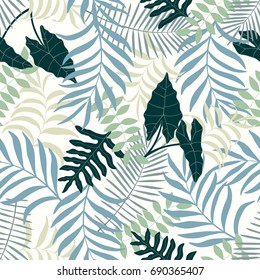 Tropical background with palm leaves. Seamless floral pattern